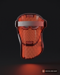 Revival Halo LED face and neck therapy mask, interior LED array visible, front-facing, powered on with warm ember glow